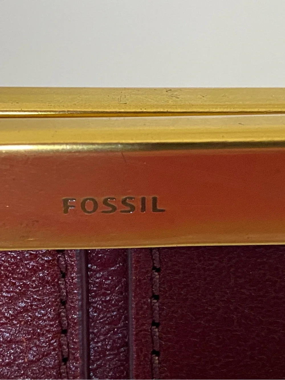 Fossil Burgundy Red Brown Sleek Leather Clutch Wallet with Gold Accent NEW